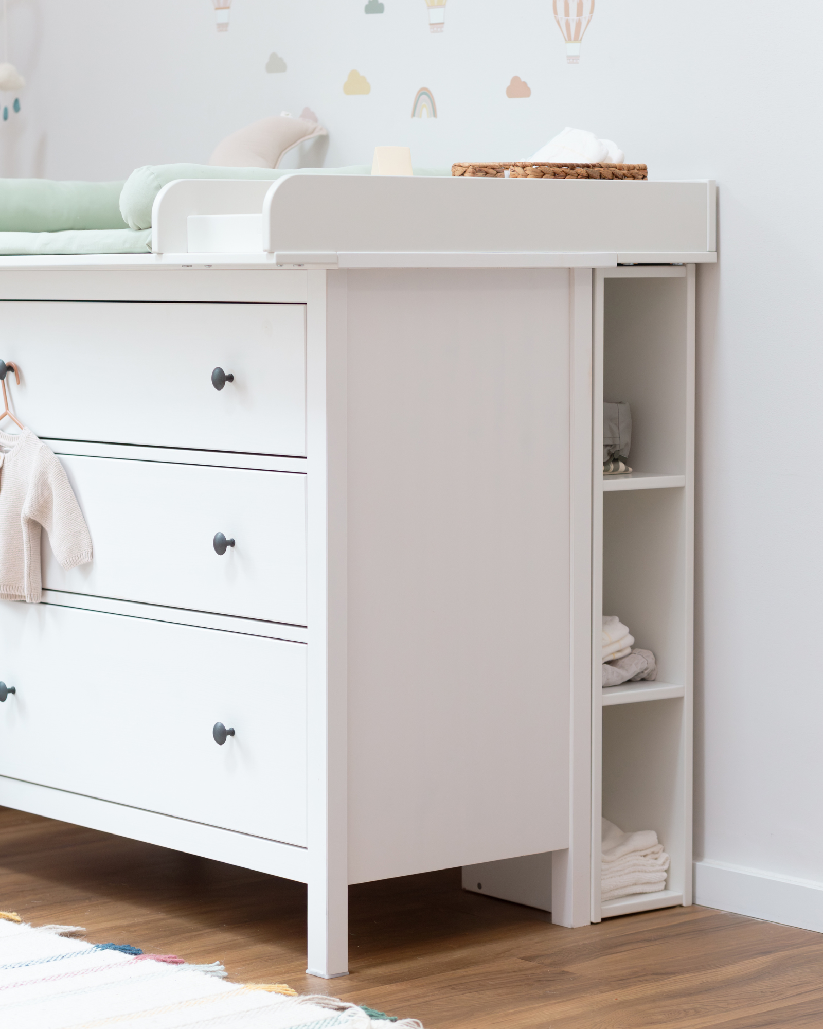 IKEA HEMNES shelving unit used as a changing table in white