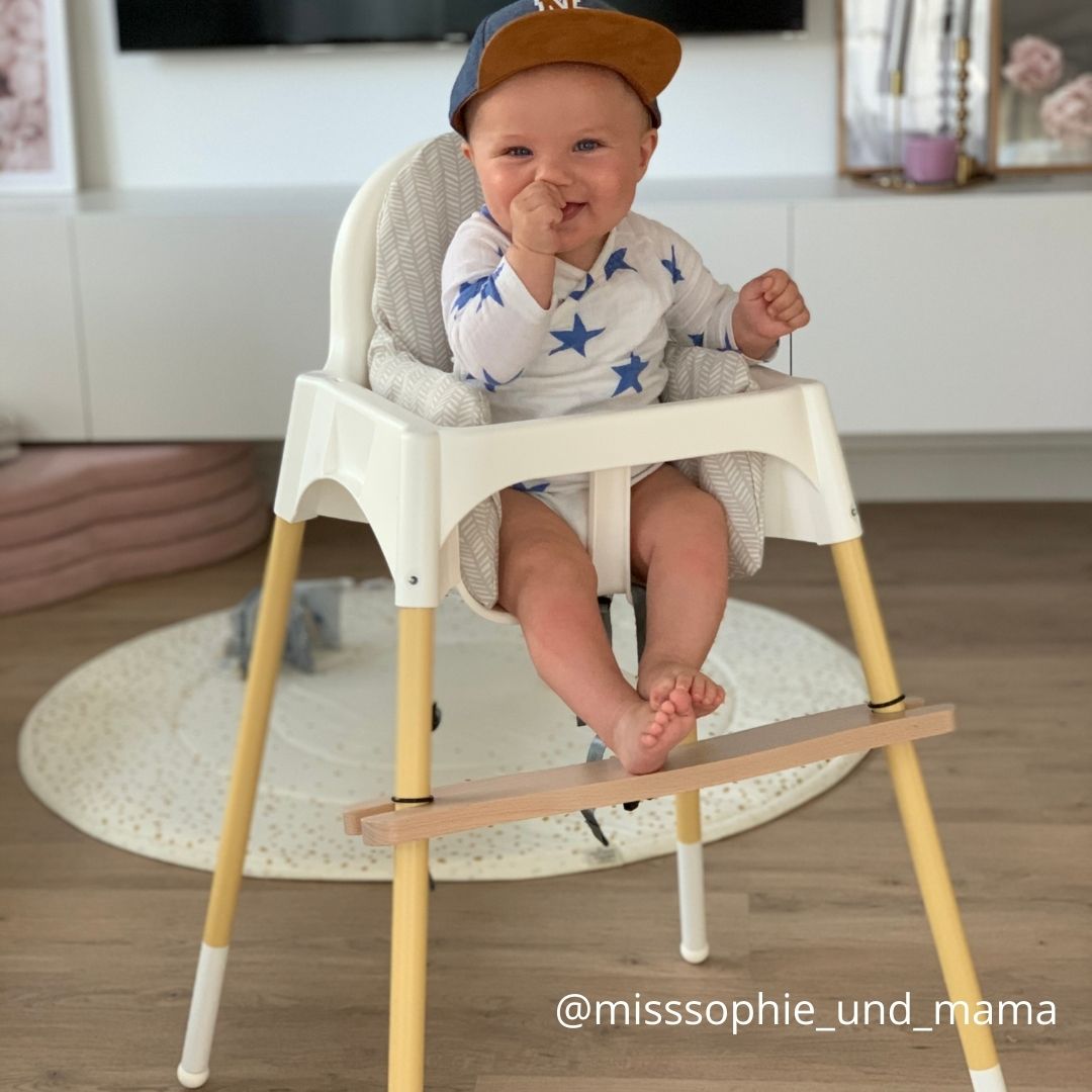 Hochstuhl mit Baby Hochstuhl mit Baby